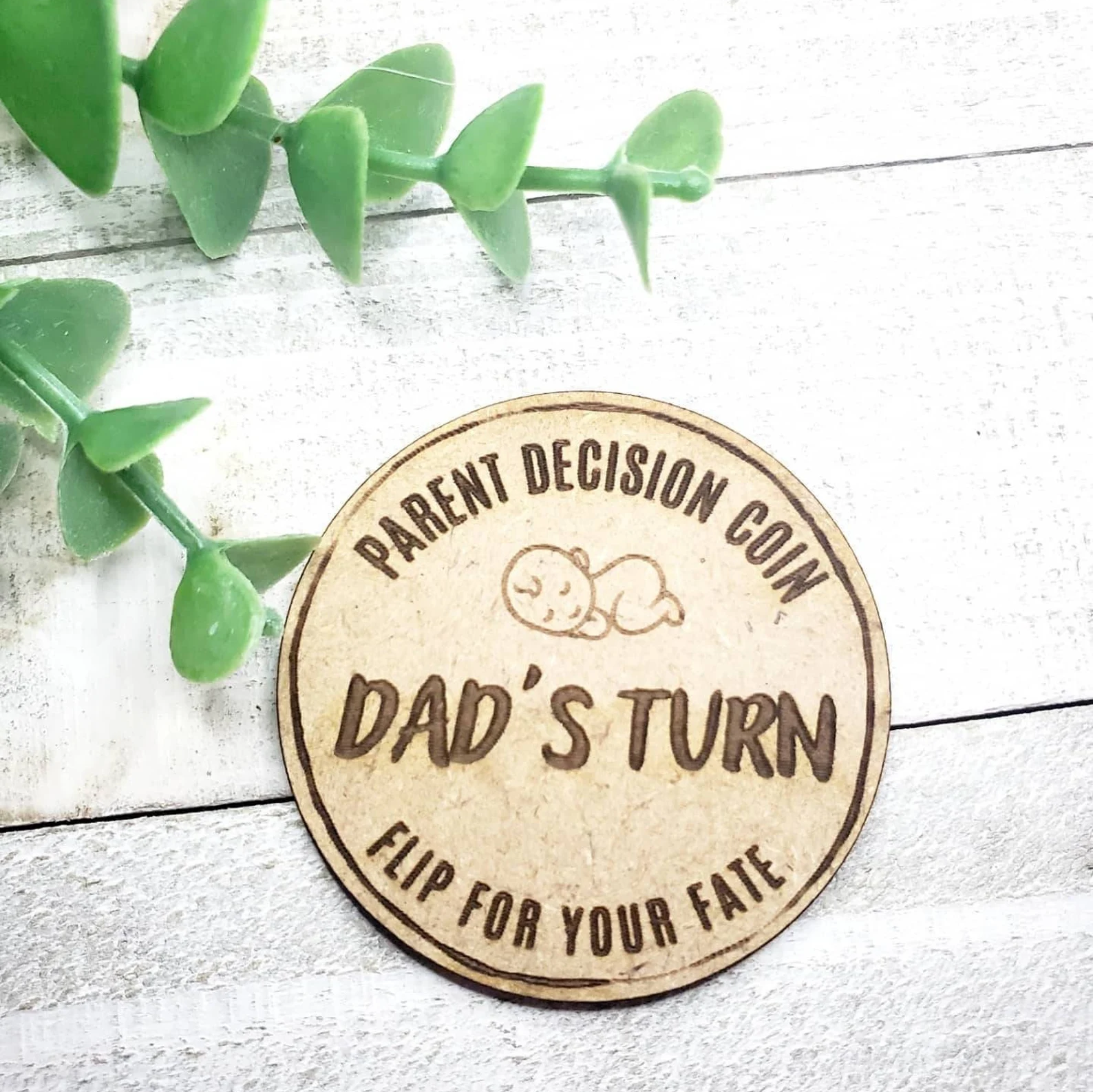 wood coin with laser engraving saying dad's turn