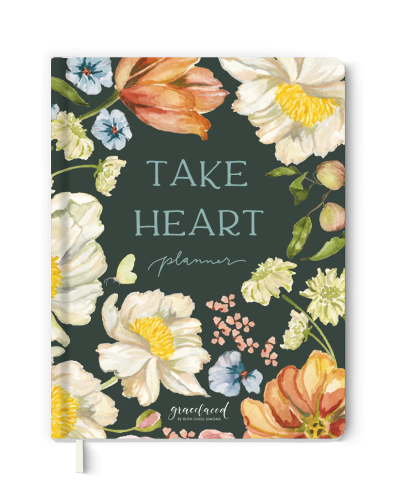dark green book cover with colorful hand-painted florals and title take heart planner