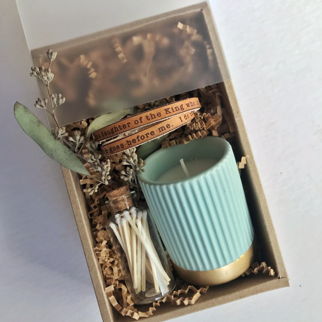 gift box with blue candle, matches, and leather double wrap bracelet