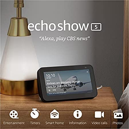Amazon Echo Show 5 on bedside table with lamp