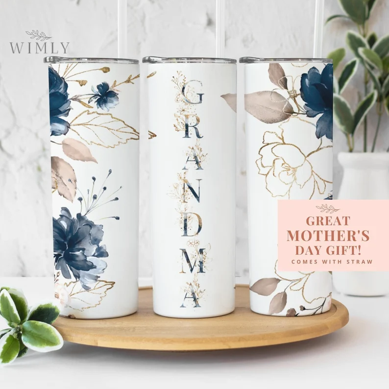 three coffee tumblers with floral prints and the word grandma