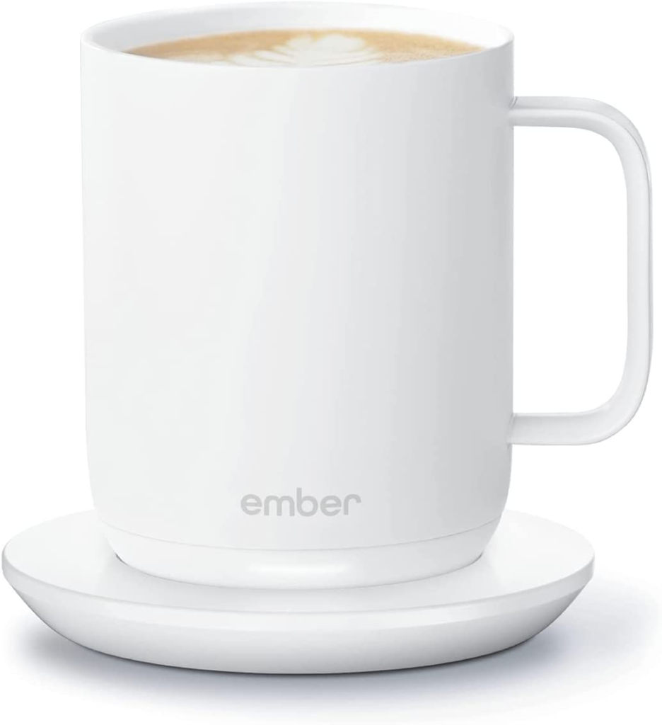 white smart mug on charging coaster