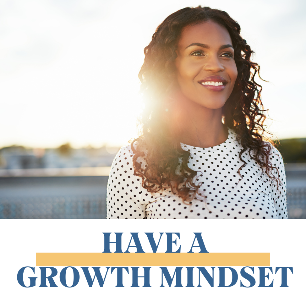 Smiling woman with a growth mindset.